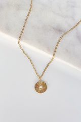 Round pendant necklace with opal center - gold